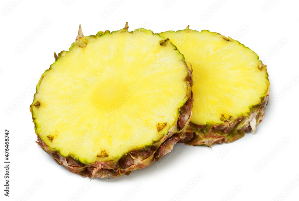 Ripe juicy round pineapple slices isolated on white background. Fresh fruits. Ripe juicy round pineapple slices isolated on white background. Fresh fruits.