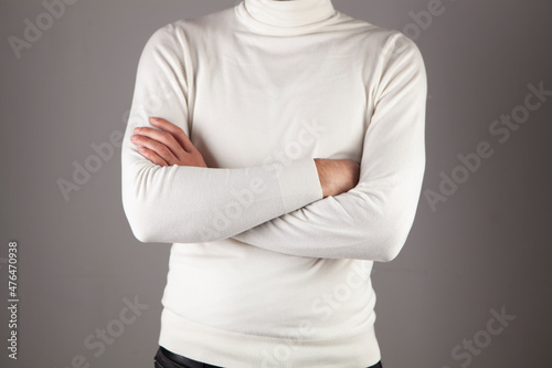 man crossed arms isolated on gray background