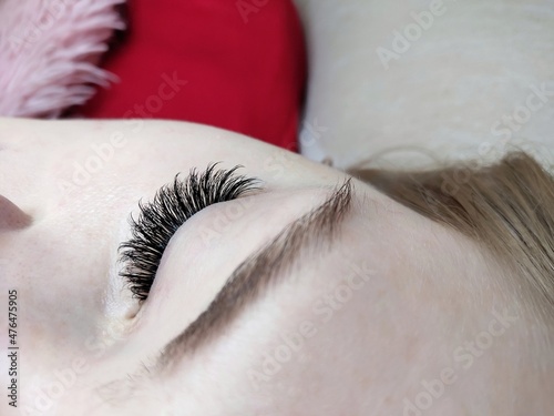 close up of a eye with feather