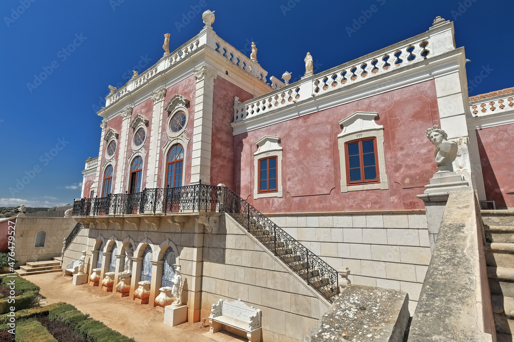 NeoRococo palace-pink façade facing the gardens-semicircular balconies-white balustrade-rooftop statues. Estoi-Algarve-Portugal-018