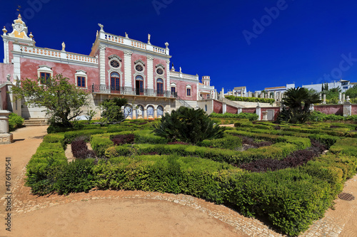South fa?ade-neoRococo palace-gravel path-trimmed hedges-clock tower-long balcony-porthole windows-rooftop statues. Estoi-Algarve-Portugal-029 © rweisswald