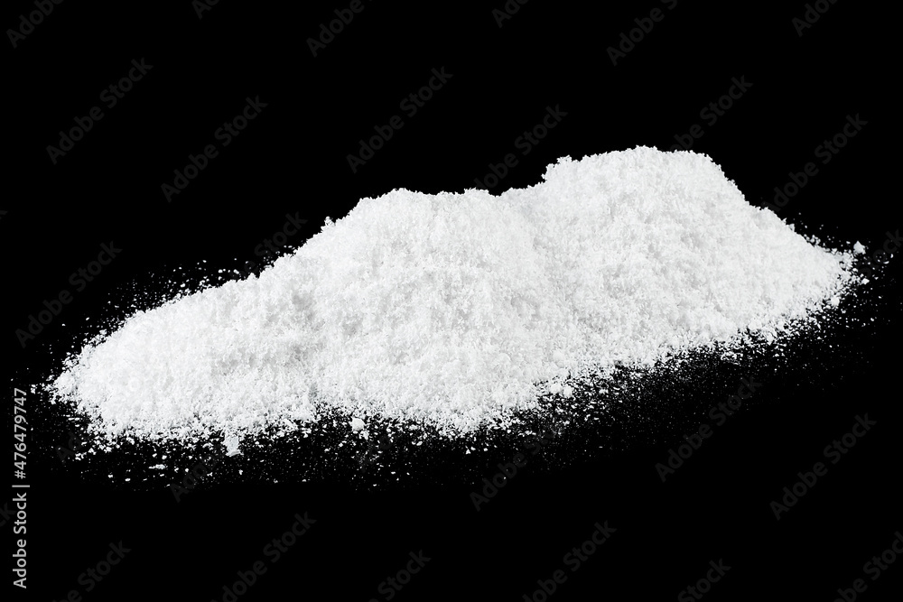 Pile of white snow isolated on a black background. White snow at night. Pile of white snow isolated on a black background. White snow at night.