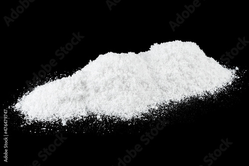 Pile of white snow isolated on a black background. White snow at night.