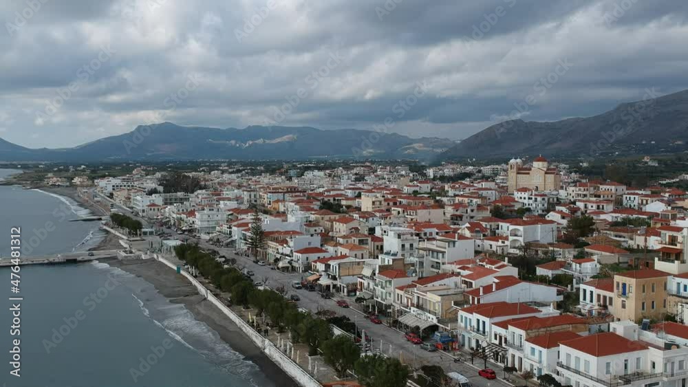 Aerial cityscape view of Neapolis town at sunset. Also named Vatika in Laconia, Greece. Neapoli is a famous coastal town built on the same site as the ancient Laconian city of Boeae Aerial cityscape view of Neapolis town at sunset. Also named Vatika in Laconia, Greece. Neapoli is a famous coastal town built on the same site as the ancient Laconian city of Boeae