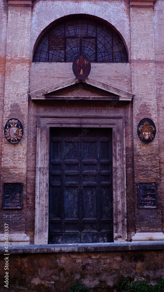 Antique doors to the church. Italy