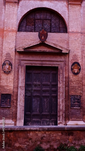 Medieval church arch portal on stone blocks facade © Маркіян Паньків