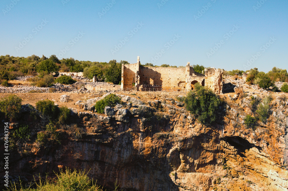 Kizkalesi,Turkey-October 11,2021:Panoramic landscape view ruins of antique city. Kanlidivane ancient city in Mersin Province, Turkey. Open air museum