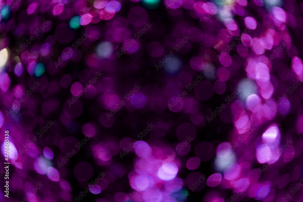 Bokeh purple on a black background. Blur and bokeh abstract , vibrant colors and textured. Good wallpapers .Copy space. Bokeh purple on a black background. Blur and bokeh abstract , vibrant colors and textured. Good wallpapers .Copy space.