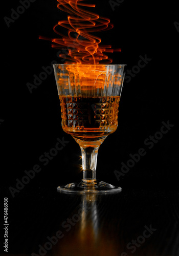 whiskey in a glass in the dark