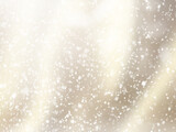 Sparkling magical dust particles like snowfall. Winter pattern best for Christmas design. Abstract golden background with bokeh effect.