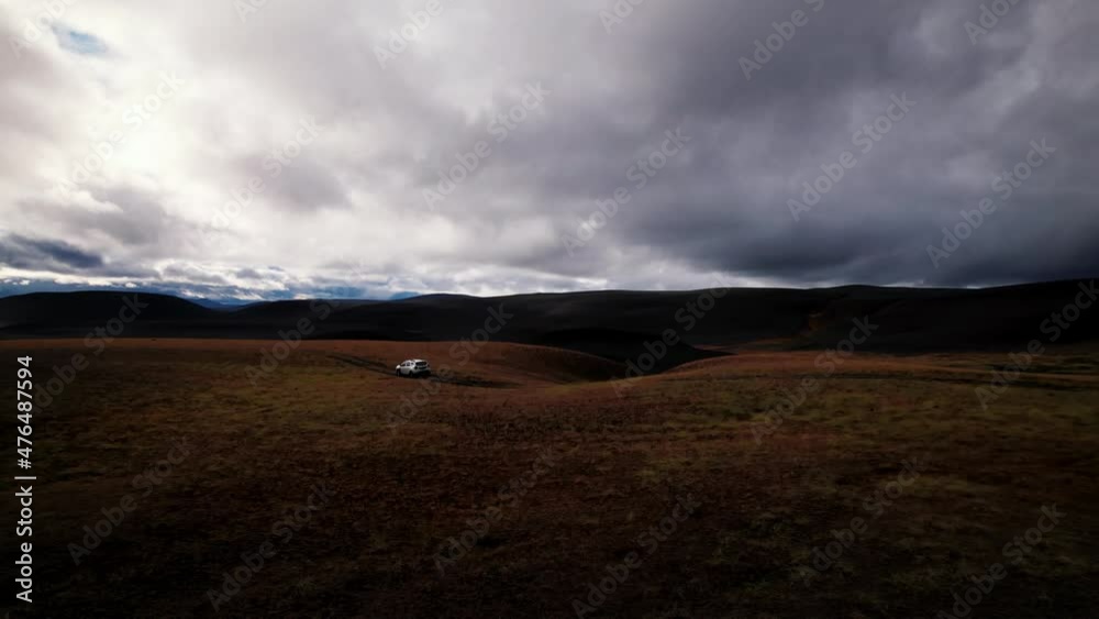Drone Tracking Truck In Dark Mountain Landscape Drone Tracking Truck In Dark Mountain Landscape
