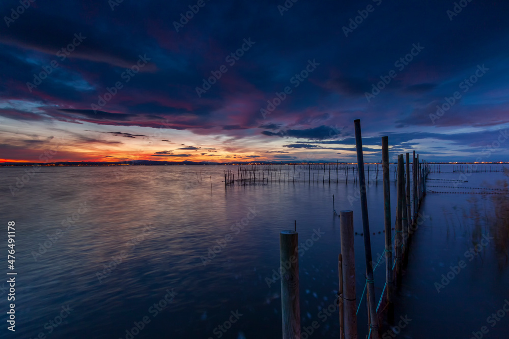 Fototapeta premium sunset over the fishing nets. La Albufera, Valencia 