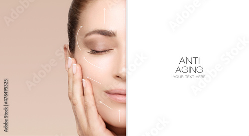 Facelift and Anti Aging Concept. Beauty Face Spa Woman with Lifting Arrows on Face. photo