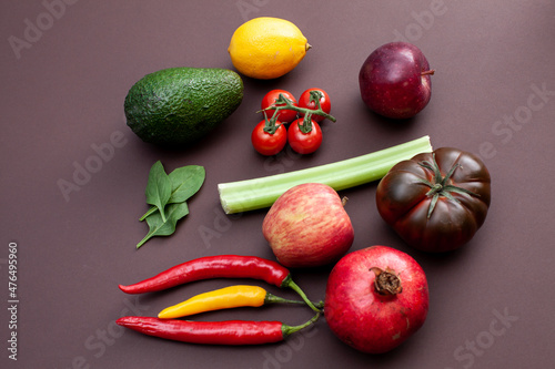 Fototapeta Naklejka Na Ścianę i Meble -  various fruits and vegetables on brown background