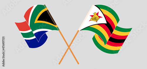 Crossed flags of South Africa and Zimbabwe. Official colors. Correct proportion