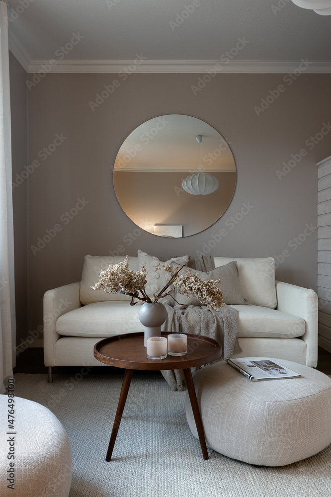 Scandinavian living room interior with round mirror on wall.  - obrazy, fototapety, plakaty 