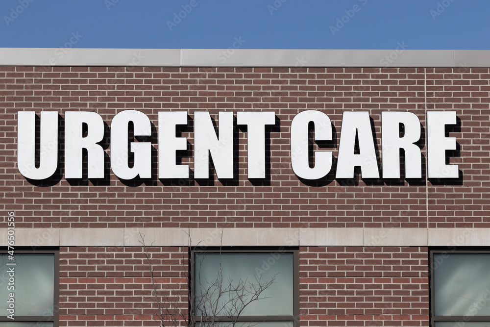 URGENT CARE sign at an outpatient health clinic. Urgent Care clinics may offer quicker service than an ER.