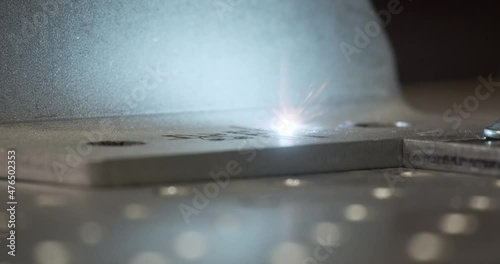 Laser engraving high precision CNC cutting metal sheet. Machinery processing production with heat fire flame. Industrial energy tool light machining metalwork technology. Automatic accuracy technology