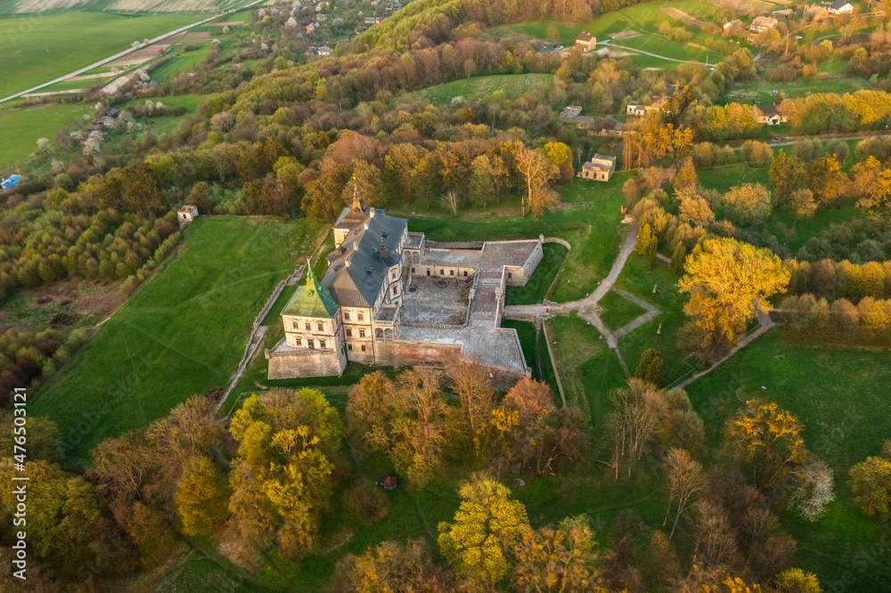 Aerial view of the ancient Ukrainian Pidhirtsi Castle. Location Pidhirtsi village, Lviv region, Ukraine, Europe. Popular European landmark. Photo from a drone. Discover the beauty of the land. Travel 
