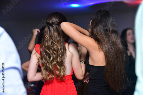 teenagers dancing in party, group of teenage girls dancing in ballroom, group of girls