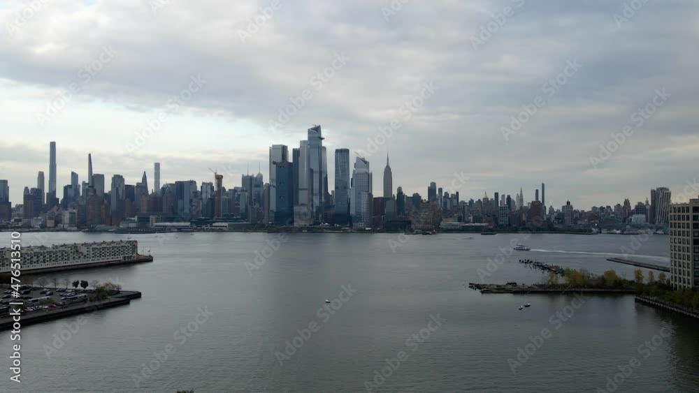 Aerial drone view over the Weehawken Cove, towards the Hudson yards skyline, in cloudy New York, United states Aerial drone view over the Weehawken Cove, towards the Hudson yards skyline, in cloudy New York, United states