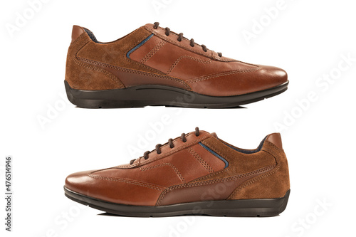 Brown leather shoes on white background.