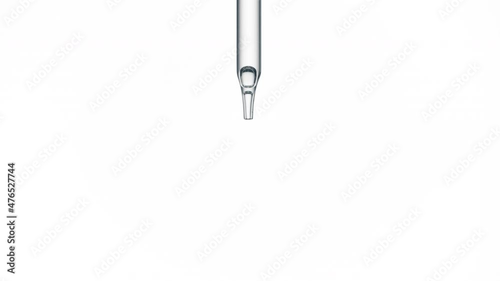 Macro shot of drop of hyaluronic acid is falling down from chemical dropper on white background | Abstract body care cosmetics with hyaluronic acid mixing concept