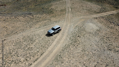 One gray car on the background of many roads