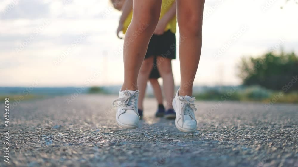 kids play classics hopscotch in the schoolyard. school kid a dream concept. playground children concept. kids jumping play on the asphalt hopscotch. game play outdoor fun