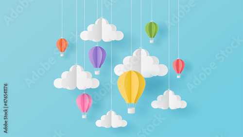 Fotografiet Paper art style of colorful hot air balloons and cloud on blue sky