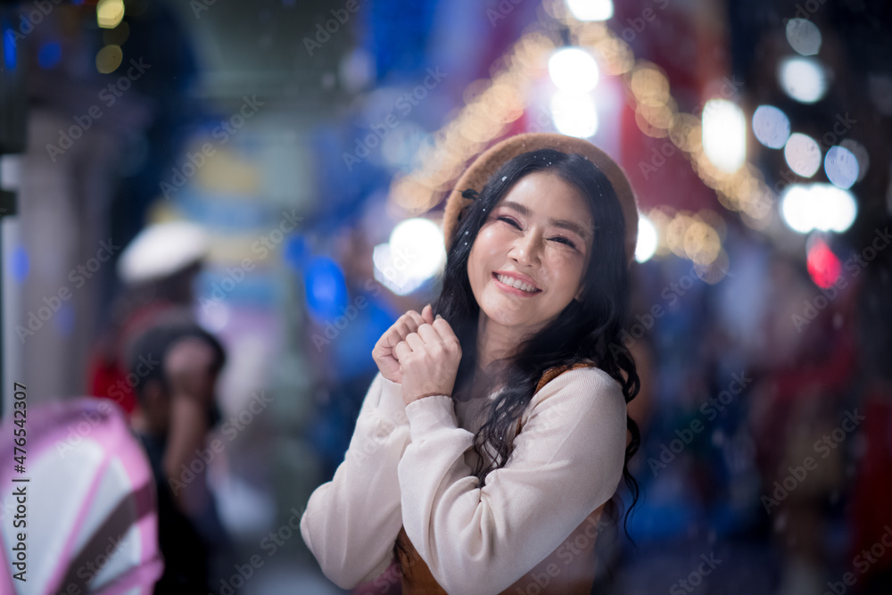 Portrait of an Asian woman at Christmas and various bokeh on her own lifestyle. Portrait of an Asian woman at Christmas and various bokeh on her own lifestyle.