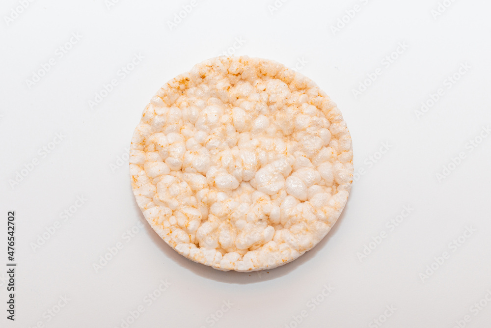 Rice Crackers on a White Background.close up,selective focus,top view,copy space. Rice Crackers on a White Background.close up,selective focus,top view,copy space.
