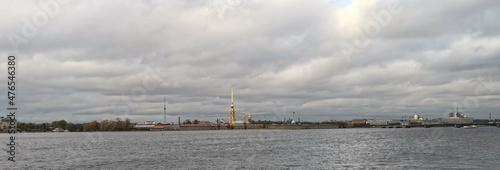 Peter and Paul Fortress in Saint Petersburg, Russia, As Seen from Neva River with Bell Tower of Saints Peter and Paul Cathedral On a Cloudy Autumn Day.
