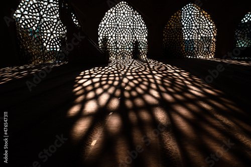 Islamic background photo. Shadows of decoration of the mosque. photo