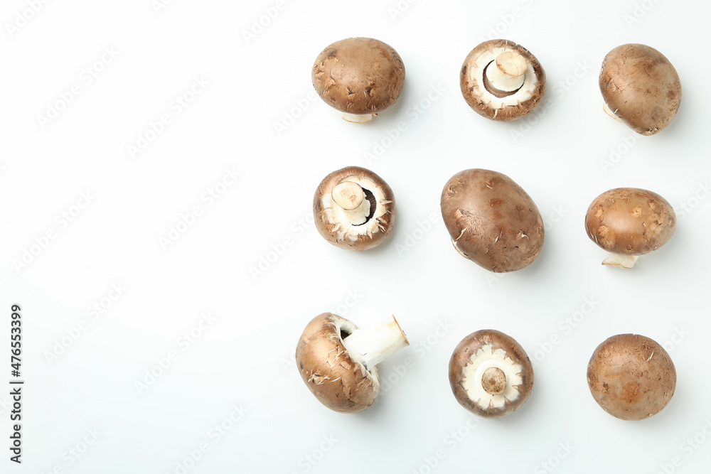 Flat lay composition with champignons on white background Flat lay composition with champignons on white background