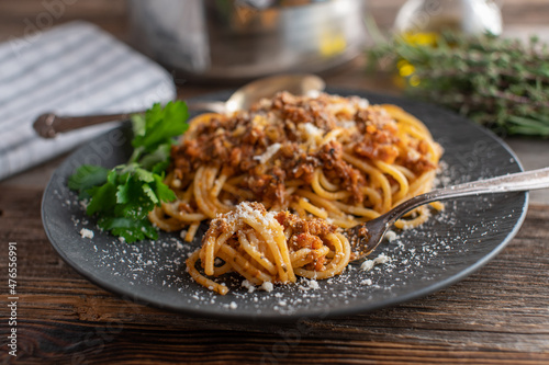 Spaghetti Bolognese on a dark plate