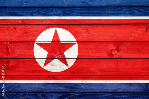 Flag of North Korea on wooden surface  photo