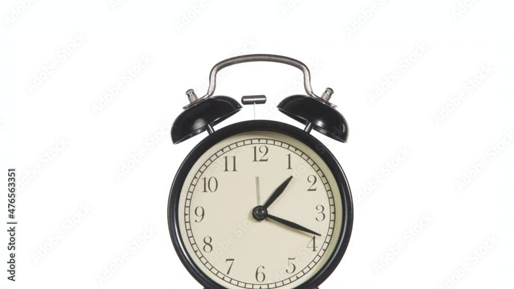 Time to Get High Profits. The hands of the clock rotate rapidly on the dial. Exactly at 12 o'clock, the alarm clock starts ringing and banknotes are slowly falling in the background on a bright white Time to Get High Profits. The hands of the clock rotate rapidly on the dial. Exactly at 12 o'clock, the alarm clock starts ringing and banknotes are slowly falling in the background on a bright white