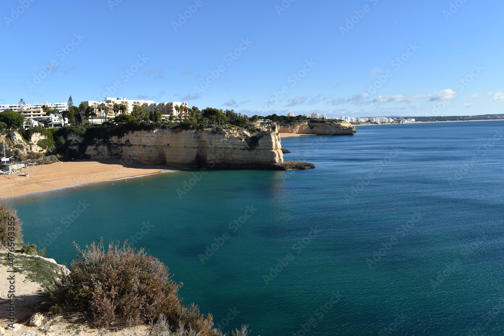 The colorful and beautiful coastline with cliffs and beaches along the Algarve in Portugal The colorful and beautiful coastline with cliffs and beaches along the Algarve in Portugal