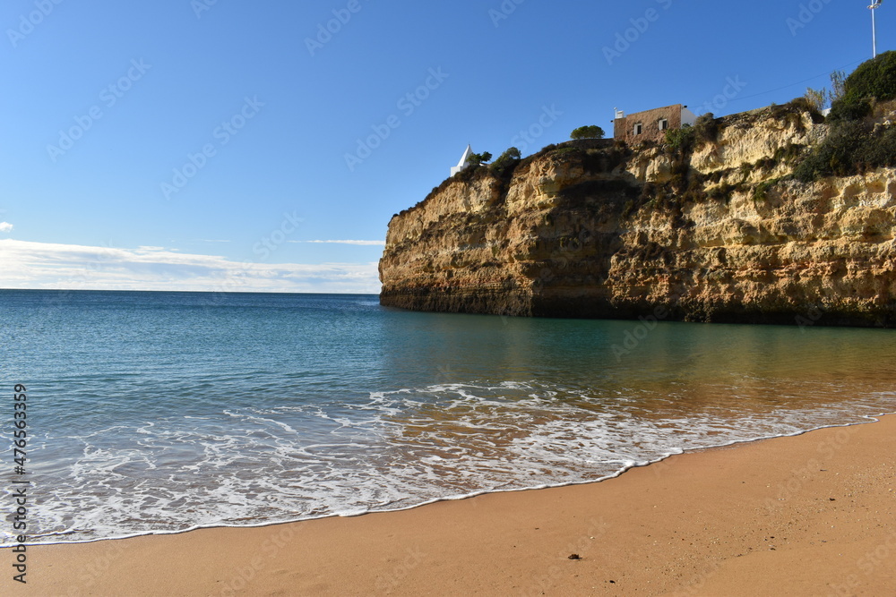 The colorful and beautiful coastline with cliffs and beaches along the Algarve in Portugal The colorful and beautiful coastline with cliffs and beaches along the Algarve in Portugal