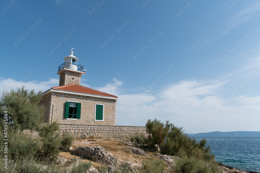 Lighthouse St. Peter on the St. Peter peninsula in Makarska, Dalmatia, Croatia during summer