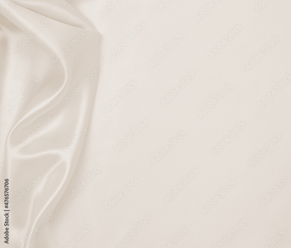 Fototapeta premium Smooth elegant golden silk or satin luxury cloth texture as wedding background. Luxurious background design. In Sepia toned. Retro style
