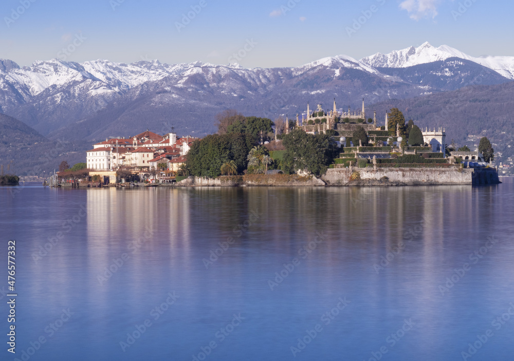 winter landscape on calm lake,Bella Island with mountains in the background.Lake Maggiore,Italy