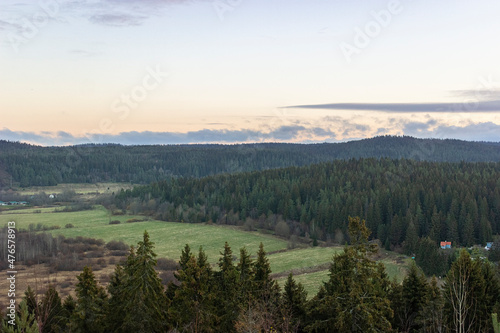 Republic of Karelia, view from Mount Paasonvuori. Green coniferous forest and clouds. The concept of privacy from the noise in nature. © Павел Чепелев