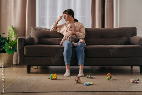 Obraz na plátně Tired single mother suffering from postpartum depression