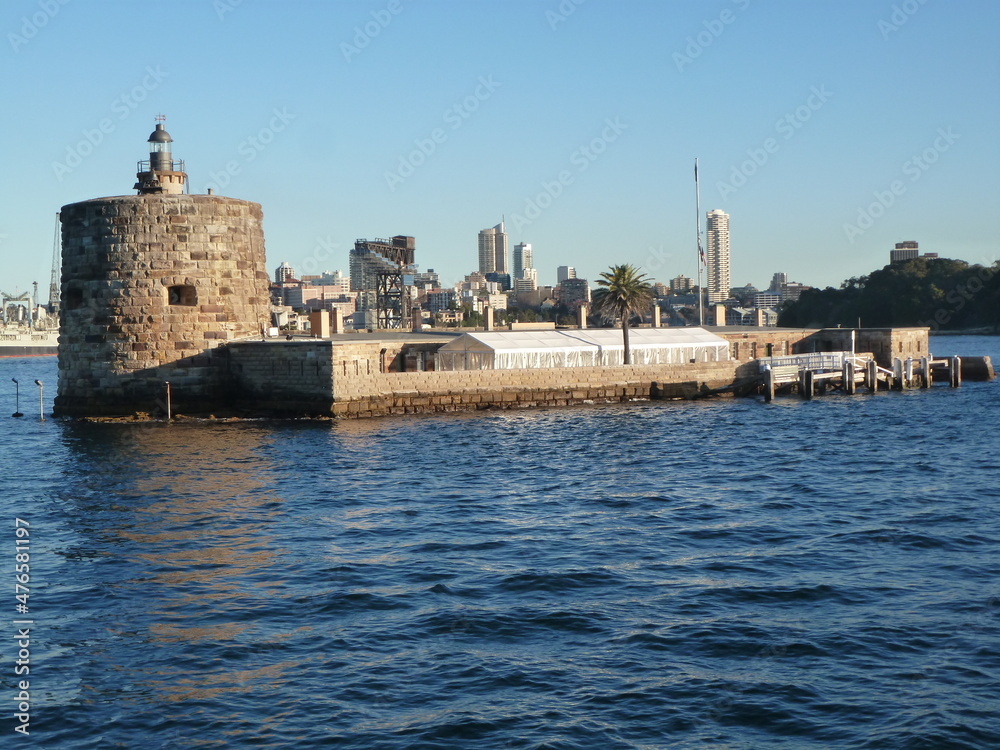 Old fortification and prison island Fort Dension against the Sydney skyline under a blue sky, Sydney, New South Wales, Australia