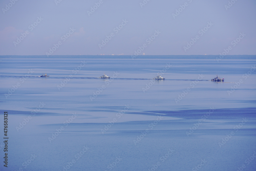 Russian warship in the sea of the Gulf of Finland. small ships boats war. High quality photo