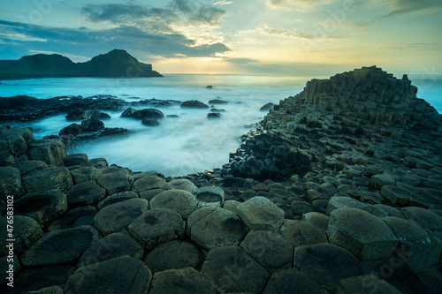 Bild auf Leinwand Sunset at the Giant's Causeway in County Antrim, Northern Ireland