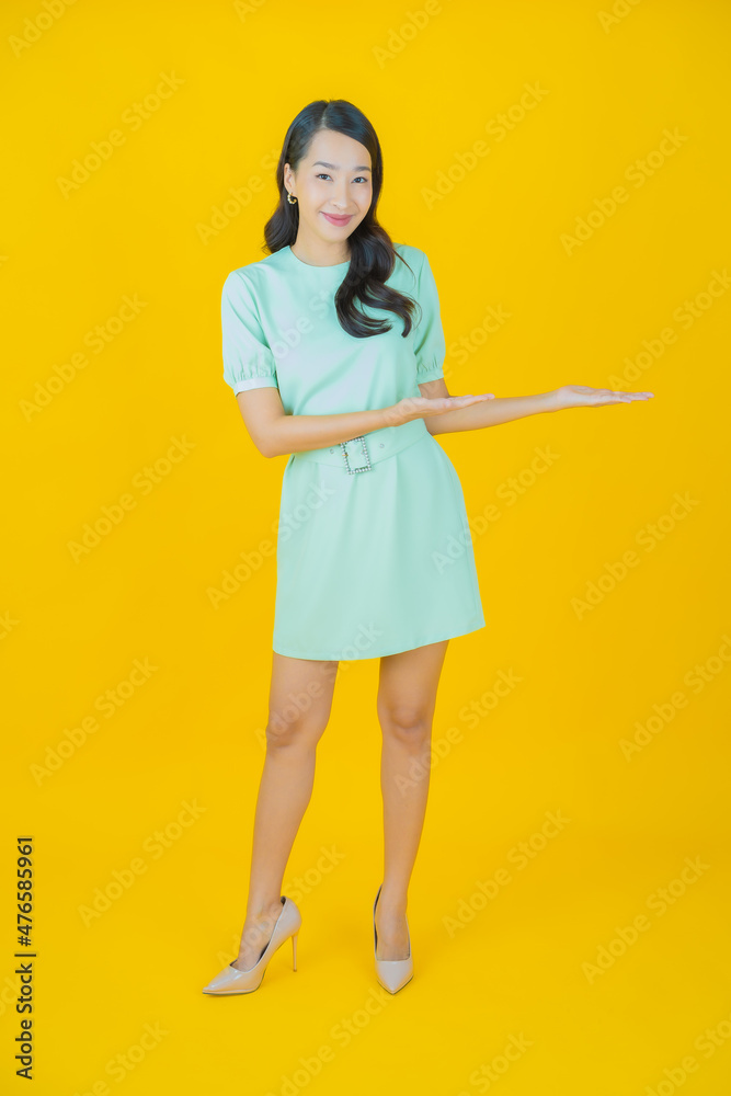 Portrait beautiful young asian woman smile with action Portrait beautiful young asian woman smile with action