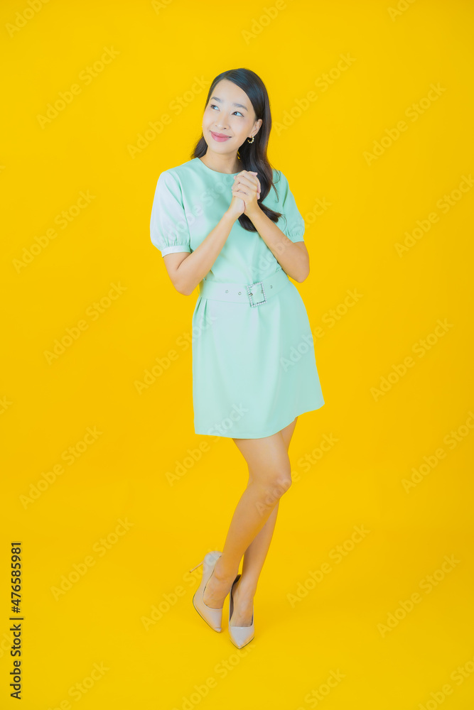 Portrait beautiful young asian woman smile with action Portrait beautiful young asian woman smile with action